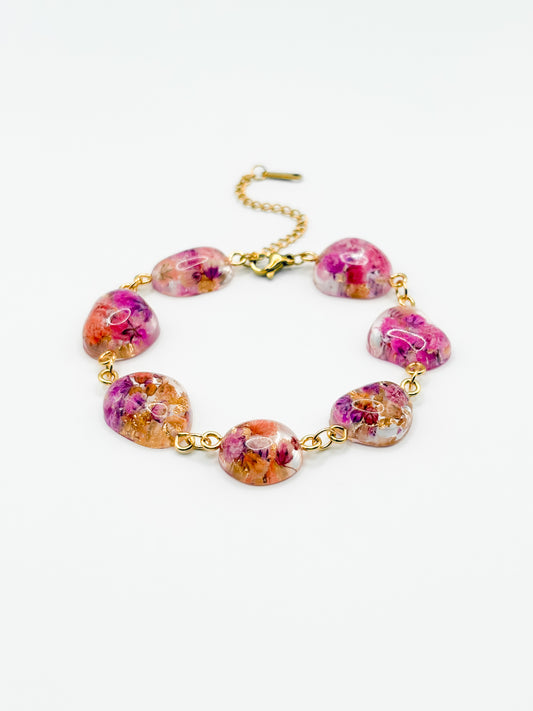 Necklace with floral beads on a white background