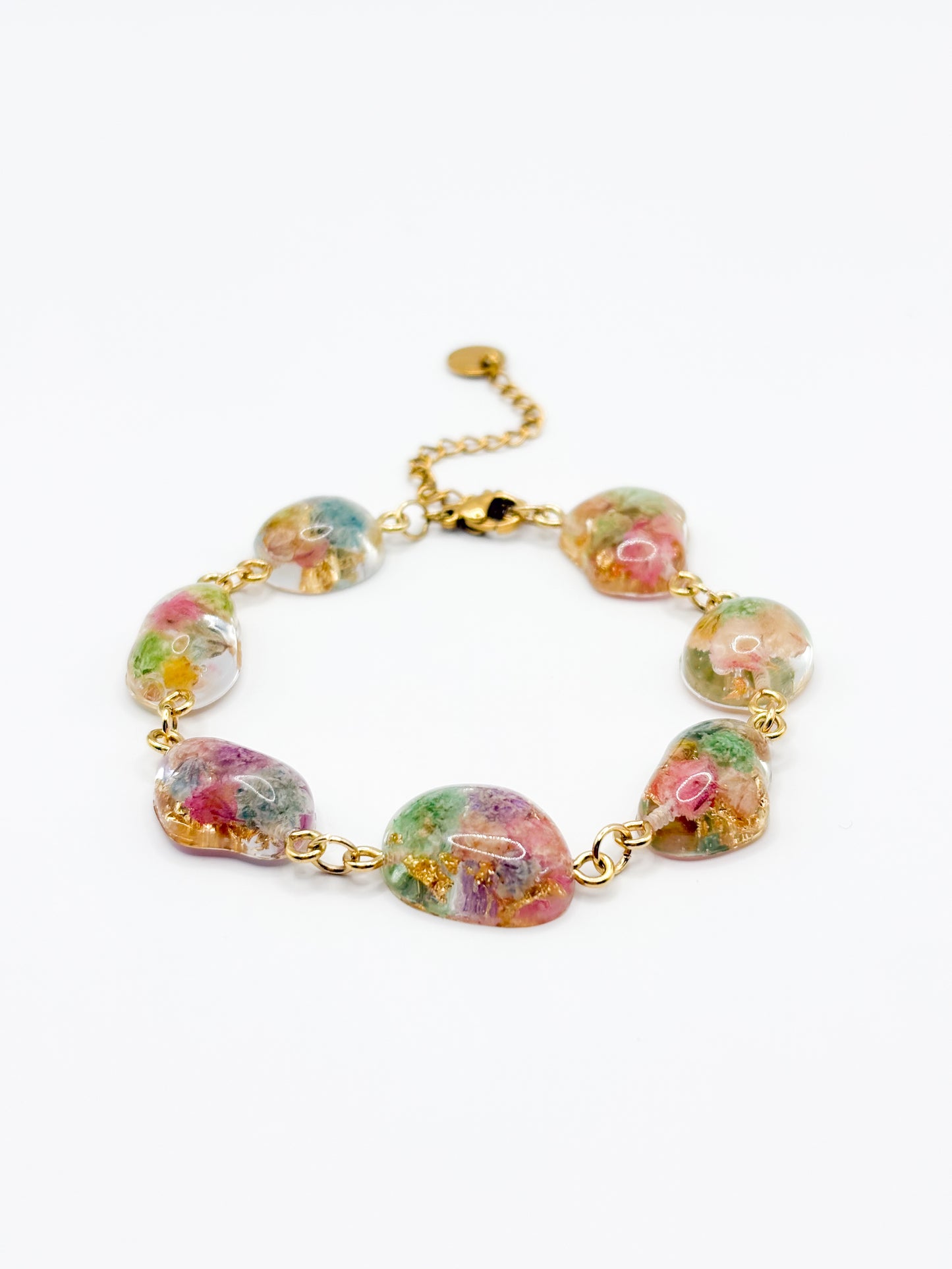 Multicolored floral bracelet on a white background