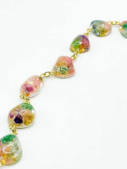 Bracelet with floral elements on a white background