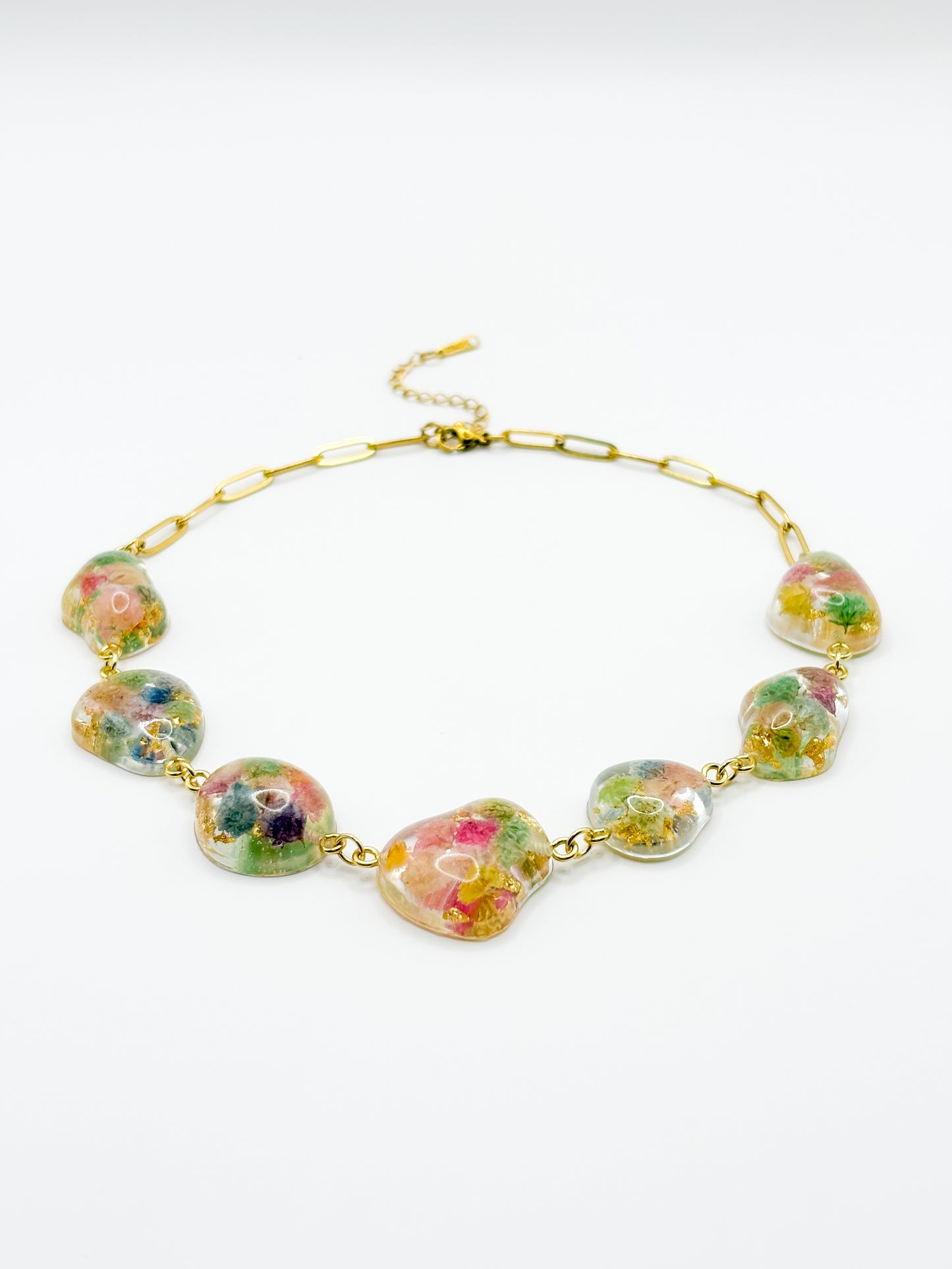 Necklace with floral beads on a white background